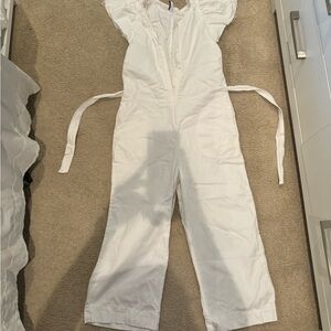 Zara White denim jumpsuit with big arms